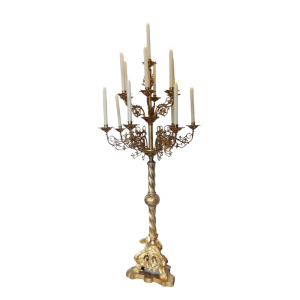 Tall gilt 13 light candelabra standing on ground