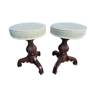 Pair of antique wooden stools with green seats