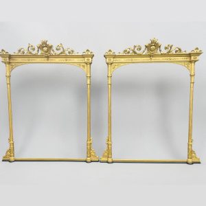 two square shaped gilt mirrors with carved crests